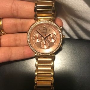 Gold coach watch
